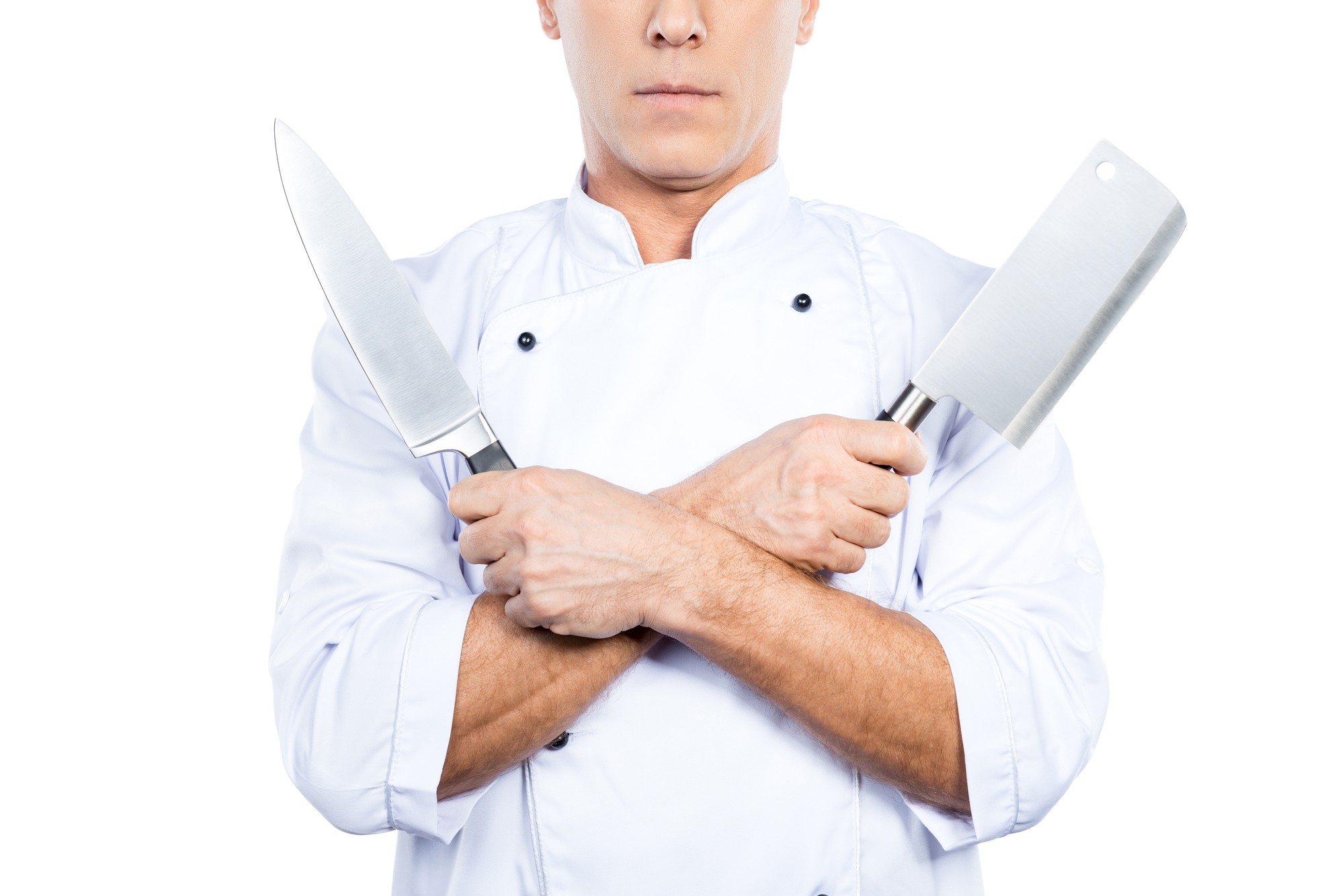 Chef locale che mostra una tecnica di taglio